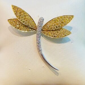 women gold brooches Tysons